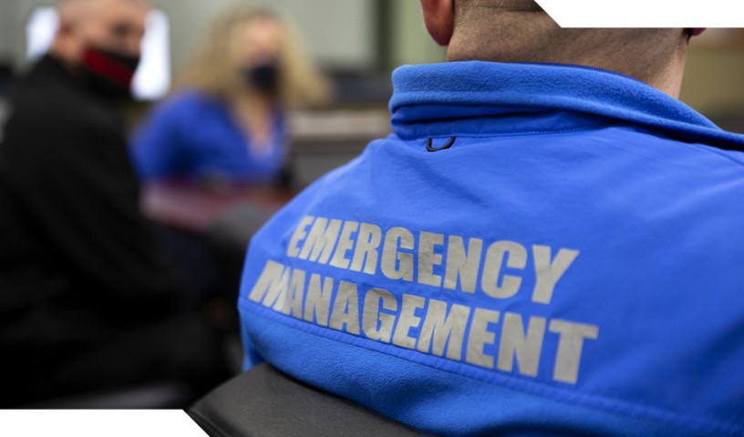 Close-up of back of a blue Emergency Management jacket