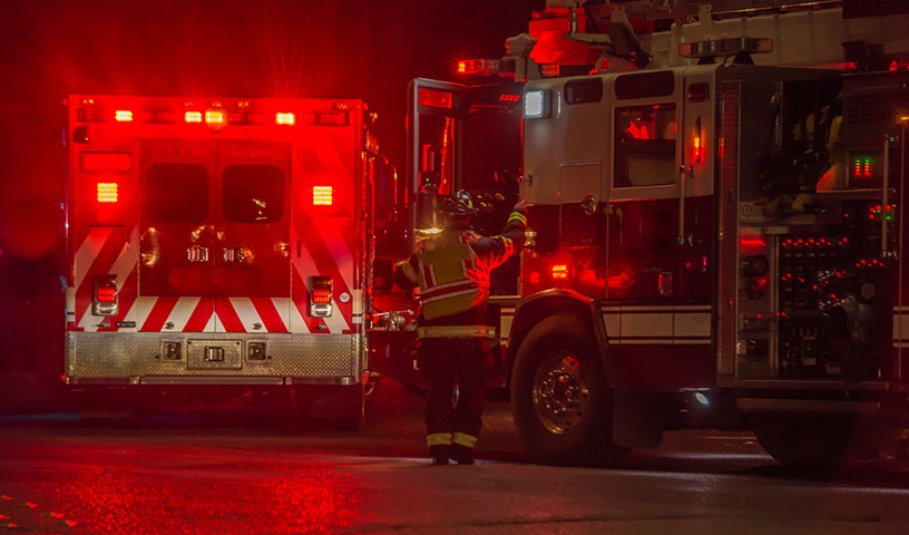 fire truck, firefighter, ambulance responding to car crash at night