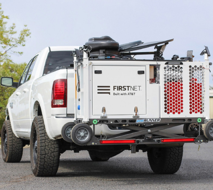 Compact Rapid Deployable unit carried on the back rack of a pick-up truck.