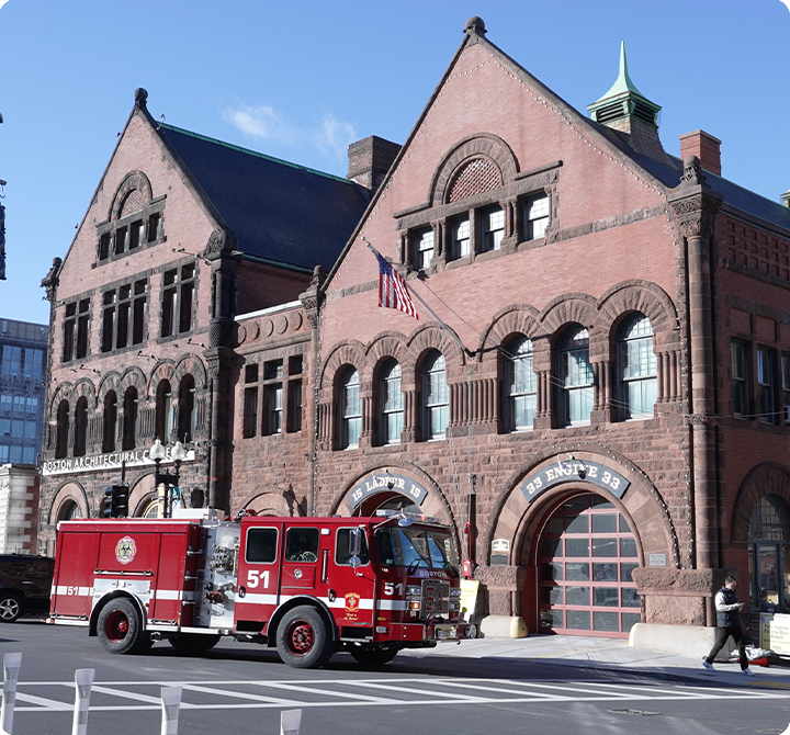 Boston Fire Department fire truck in front of fire station
