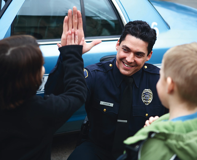 Law enforcement officer with children